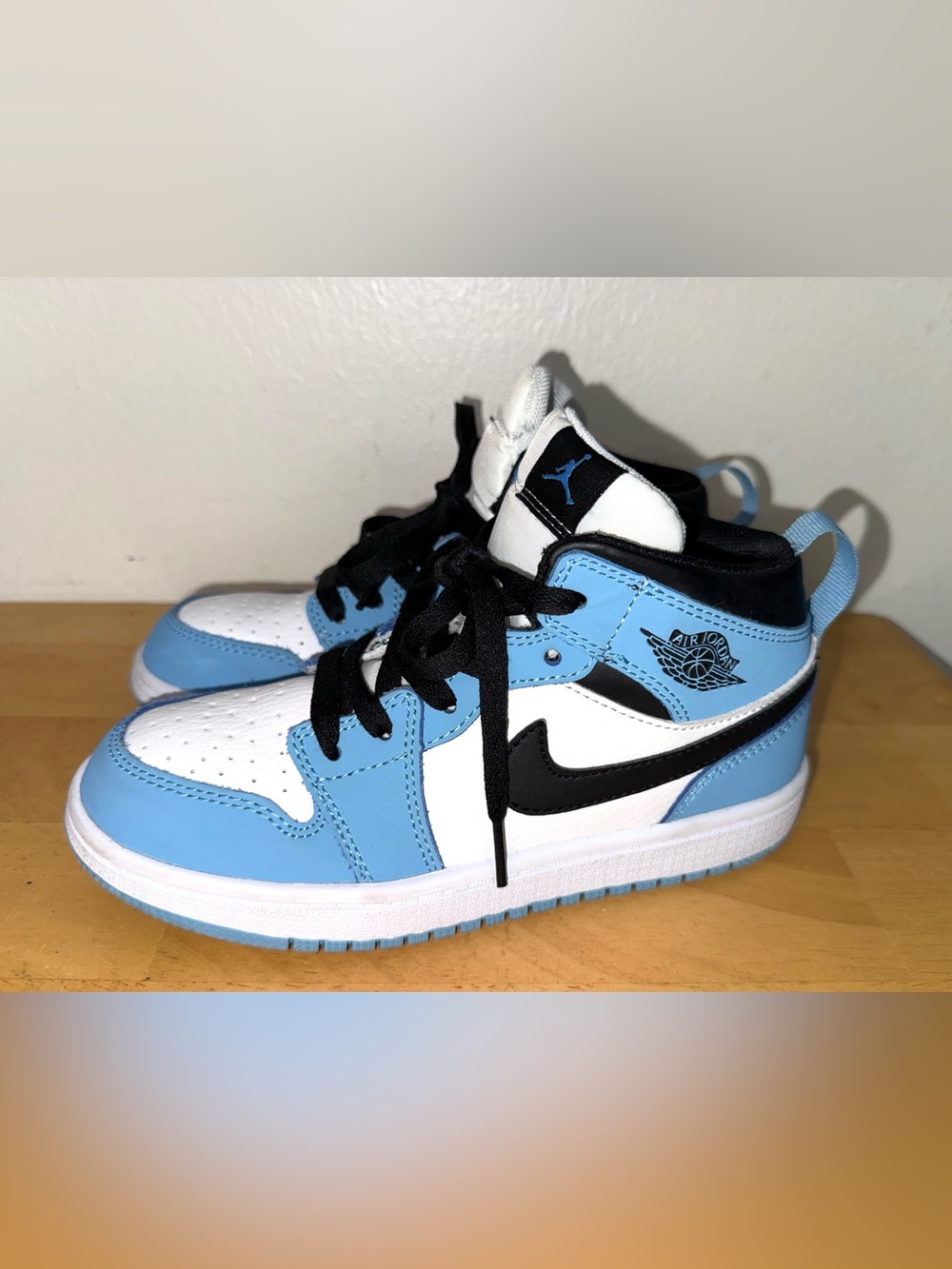 Air Jordan 1 Mid (TD / PS) sneakers in "Ice Blue/Black-Sail-White" colorway, 2.5